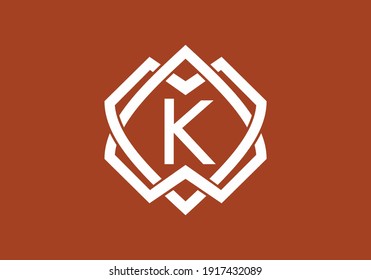 Brown white K initial letter in frame design