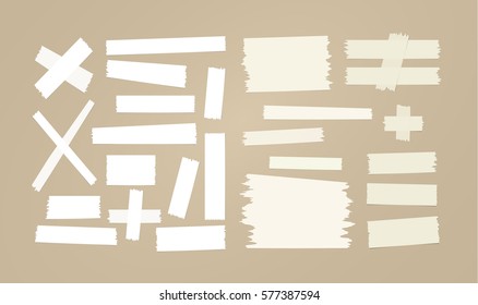 Brown and white sticky paper, adhesive, masking tape stuck on brown background
