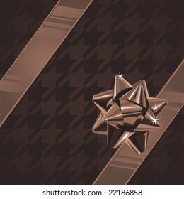Brown wrapped present with houndstooth wrapping paper