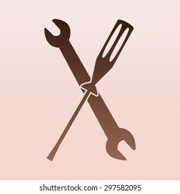 Brown wrench and screwdriver icon 