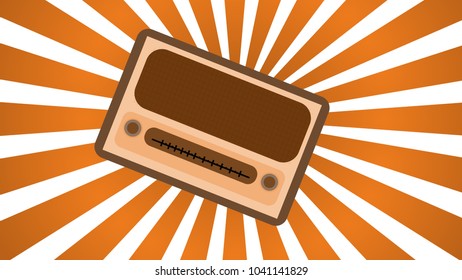 Brown with yellow old retro antique vintage rectangular first hipster radio, music radio receiver with round dials on a background of brown background rays.
