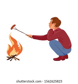 Brown-haired camper boy in the sweater roasting sausage over the campfire. Vector illustration in flat cartoon style.