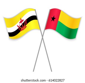 Bruneian and Bissau-Guinean crossed flags. Brunei combined with Guinea-Bissau isolated on white. Language learning, international business or travel concept.