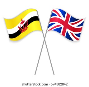 Bruneian and British crossed flags. Brunei combined with United Kingdom isolated on white. Language learning, international business or travel concept.