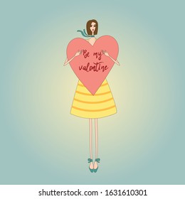 Brunette girl with a heart be my valentine