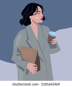 A brunette girl holds a bag, and in the other hand a glass of coffee with her. A woman in a stylish autumn look. Not her coat. The concept of street style for walking or going to work. Casual style