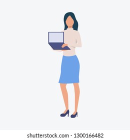 Brunette girl with laptop. Freelance, working, open space. Can be used for topics like professional , work, job