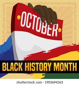 Brunette hand holding a calendar in paper block, decorated with brush strokes resembling African colors to celebrate Black History Month on October.