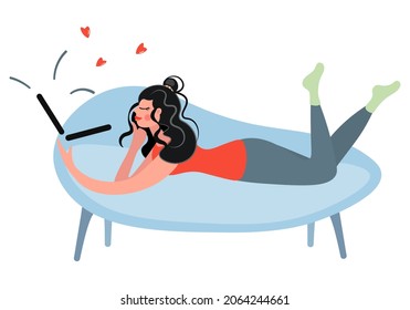 Brunette with a laptop. A cute girl lies in a relaxed position on the couch and communicates online. Virtual acquaintance, love relationships on the computer. Isolated vector design. Flat style.