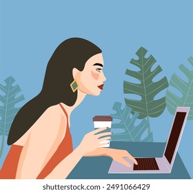 A brunette woman in a red dress works for laptops in the office. A girl working from coffee online. A girl against the background of plants with a mug of coffee in her hands is sitting at the table.