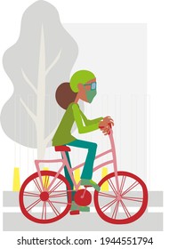 
Brunette woman riding a bicycle down the street on the bike path