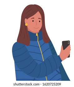 Brunette woman standing and messaging on phone. Person hold smartphone in hand. Lady dressed in warm cloth, blue overcoat. Adult isolated on white background. Vector illustration in flat style