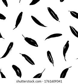 Brush black long leaves vector seamless pattern. Silhouettes of banana leaves, eucalyptus foliage. Hand drawn black paint ink illustration with abstract plant motif. Grunge dry paint brushstrokes