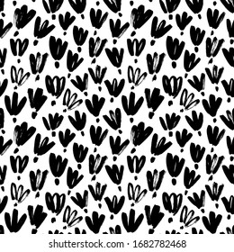 Brush black loose flowers vector seamless pattern. Hand drawn black paint ink illustration with abstract floral motif. Hand drawn painting for your fabric, wrapping paper, wallpaper design