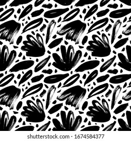 Brush black loose leaves and flowers vector seamless pattern. Hand drawn black paint ink illustration with abstract floral motif. Hand drawn painting for your fabric, wrapping paper, wallpaper design