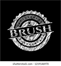 Brush chalk emblem written on a blackboard
