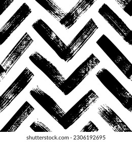 Brush drawn bold herrigbones seamless pattern. Vector zigzag motif. Geometric chevron abstract background with rough bold stripes. Modern geometric background in sketchy style. Grunge chevron pattern.