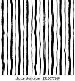 Brush drawn ink uneven textured stripes, strokes seamless vector pattern. Doodle style uneven bars, streaks, wavy lines of different width with rough edges texture. Black and white elegant background.