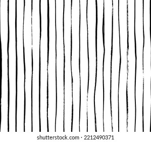 Brush drawn thin vertical lines seamless pattern. Decorative ornament with handdrawn lines. Grungy ink doodles with stripes. Black and white geometric pattern. Vertical parallel straight brush strokes