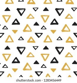 Brush drawn various triangles, egyptian pyramid seamless vector pattern. Abstract hand drawn chaotic texture. Various triangle shapes with textured edges. Black and yellow, gold geometric background.