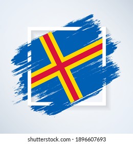 Brush flag of Aland Islands with grunge abstract brush stroke on white frame background