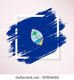 Brush flag of Guam with grunge abstract brush stroke on white frame background