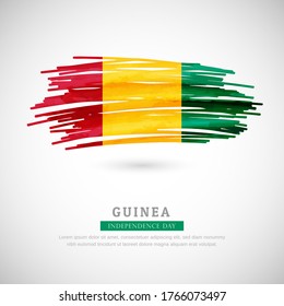 Brush flag of Guinea country. Happy independence day of Guinea with grungy flag background