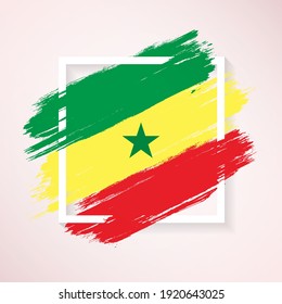Brush flag of Senegal with grunge abstract brush stroke on white frame background