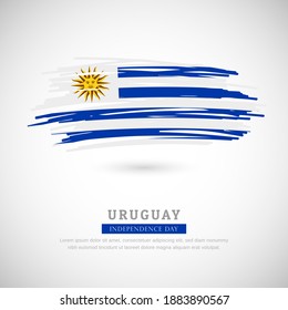 Brush flag of Uruguay country. Happy independence day of Uruguay with grungy flag background