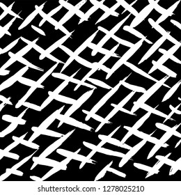 Brush grunge pattern. White and black vector.