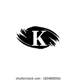 Monograma de la letra del pincel K en color blanco y negro.