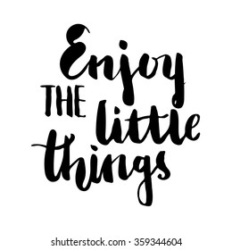 Brush lettering composition. Isolated phrase Enjoy the little things on white background.