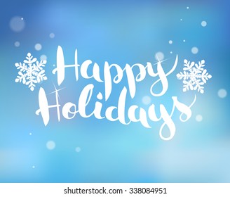 Brush  lettering on a blue background with snowflakes Happy Holidays. Vector.