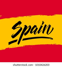 Brush painted abstract flag of Spain. Lettering word Spain on the flag background