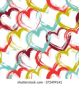 Brush painted color hearts. Love seamless pattern. Valentine's Day design. Romantic background. 