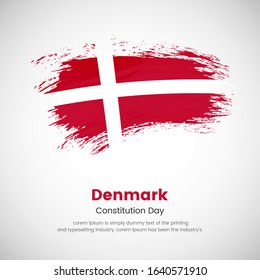 Brush painted grunge flag of Denmark country. Independence day of Denmark. Abstract creative painted grunge brush flag background.