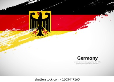 Brush painted grunge flag of Germany country. Hand drawn flag style of Germany. Creative brush stroke abstract concept brush flag background.