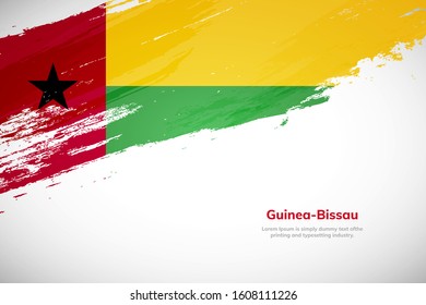 Brush painted grunge flag of Guines-Bissau country. Hand drawn flag style of Guines-Bissau. Creative brush stroke abstract concept brush flag background.