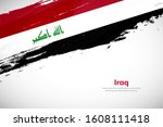 Brush painted grunge flag of Iraq country. Hand drawn flag style of Iraq. Creative brush stroke abstract concept brush flag background.