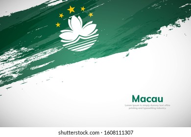 Brush painted grunge flag of Macau country. Hand drawn flag style of Macau. Creative brush stroke abstract concept brush flag background.