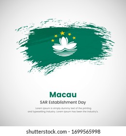Pinselgemalte Grunge-Fahne des Landes Macau. SAR-Tag der Gründung von Macau. Abstrakter, eleganter, farbiger Grunge-Pinselhintergrund.