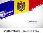 Brush painted grunge flag of Moldova country. Hand drawn flag style of Moldova. Creative brush stroke abstract concept brush flag background.