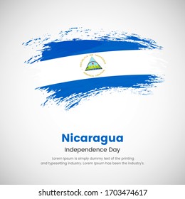Brush painted grunge flag of Nicaragua country. Independence day of Nicaragua. Abstract classic painted grunge brush flag background.