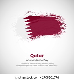 Brush painted grunge flag of Qatar country. Independence day of Qatar. Abstract creative painted grunge brush flag background.