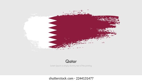 Brush painted grunge flag of Qatar. Abstract dry brush flag on isolated background
