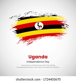 Brush painted grunge flag of Uganda country. Independence day of Uganda. Abstract painted grunge brush flag background.