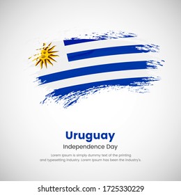 Brush painted grunge flag of Uruguay country. Independence day of Uruguay. Abstract classic painted grunge brush flag background.