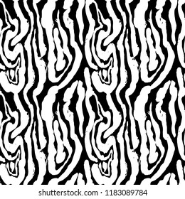 Brush painted zebra seamless pattern. Black and white stripes grunge background.