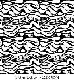 Brush painted zebra seamless pattern. Black and white stripes grunge background.