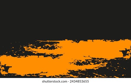 Manchas de pincel, salpicaduras de pintura en tonos naranjas sobre un fondo negro